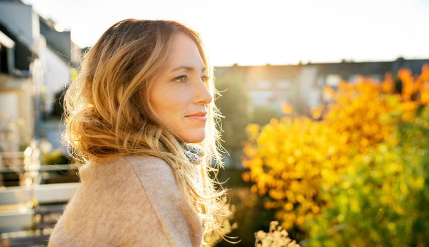 a woman outside on a fall day